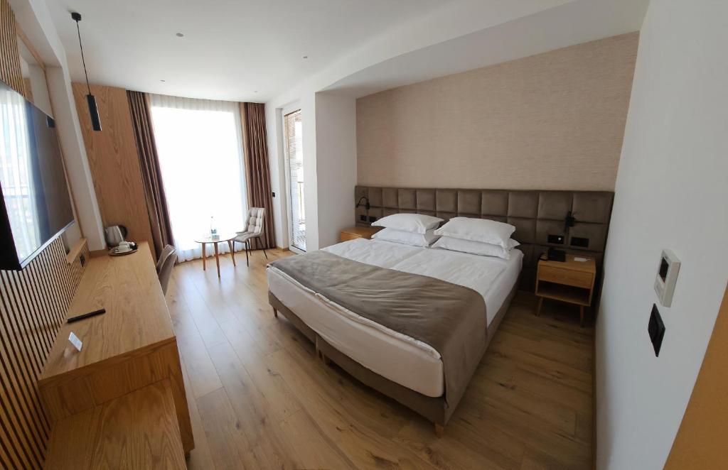 Postel nebo postele na pokoji v ubytování SIBB Hotel