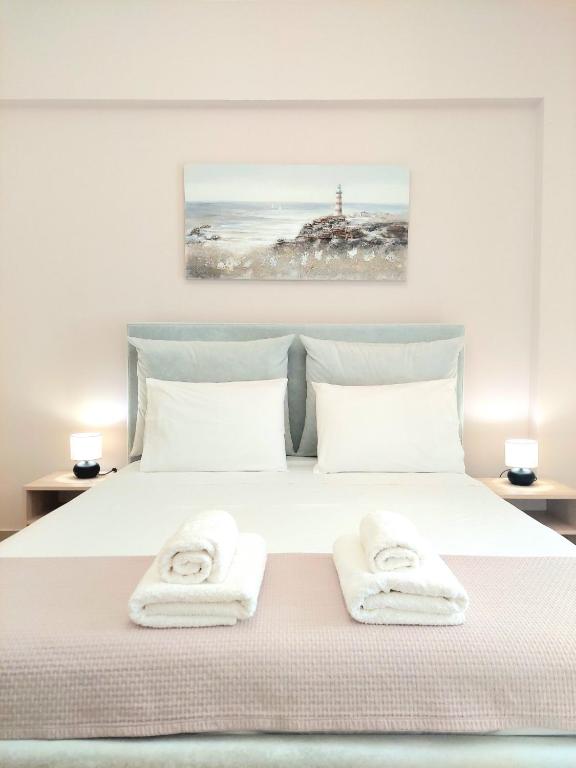 Postel nebo postele na pokoji v ubytování Elizabeth Apartments Himare