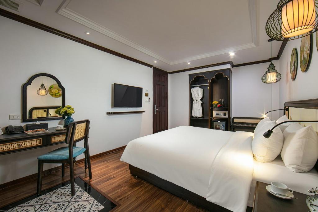 TV a/nebo společenská místnost v ubytování Media Central Hotel & Spa