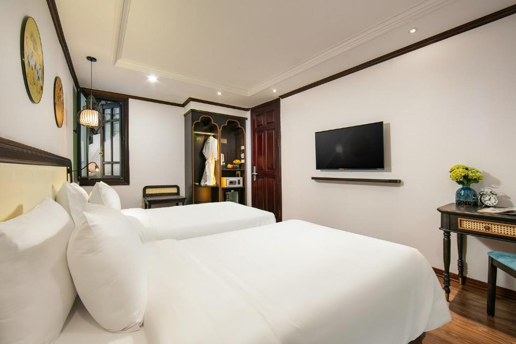 Postel nebo postele na pokoji v ubytování Media Central Hotel & Spa