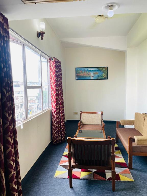 Posezení v ubytování Gautam Hotel