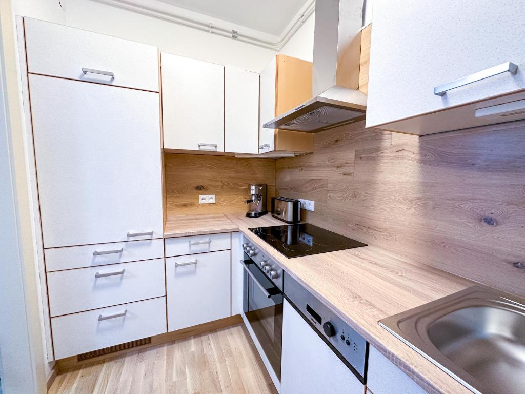 Kuchyň nebo kuchyňský kout v ubytování Wohnung zum Wohlfühlen!