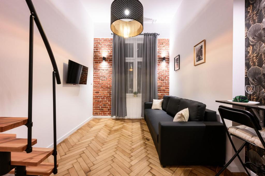 Televiisor ja/või meelelahutuskeskus majutusasutuses DIETLA 99 APARTMENTS - IDEAL LOCATION - in the heart of Krakow