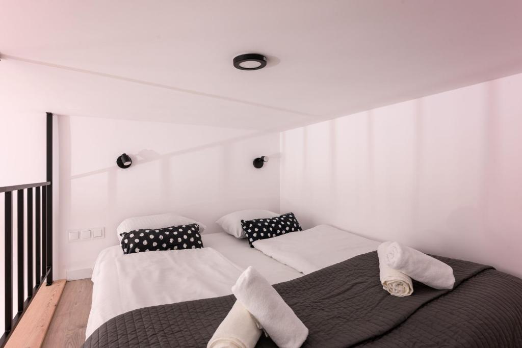 Voodi või voodid majutusasutuse DIETLA 99 APARTMENTS - IDEAL LOCATION - in the heart of Krakow toas