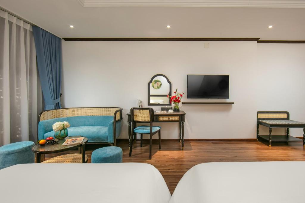 TV a/nebo společenská místnost v ubytování Media Central Hotel & Spa