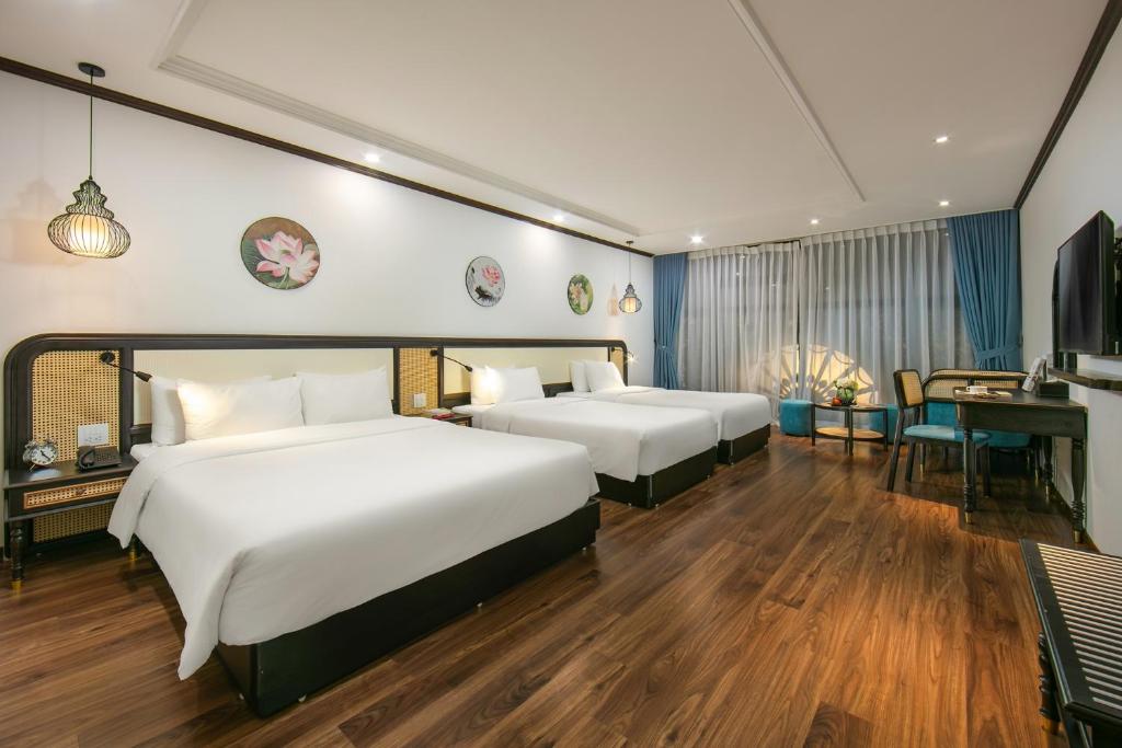Postel nebo postele na pokoji v ubytování Media Central Hotel & Spa