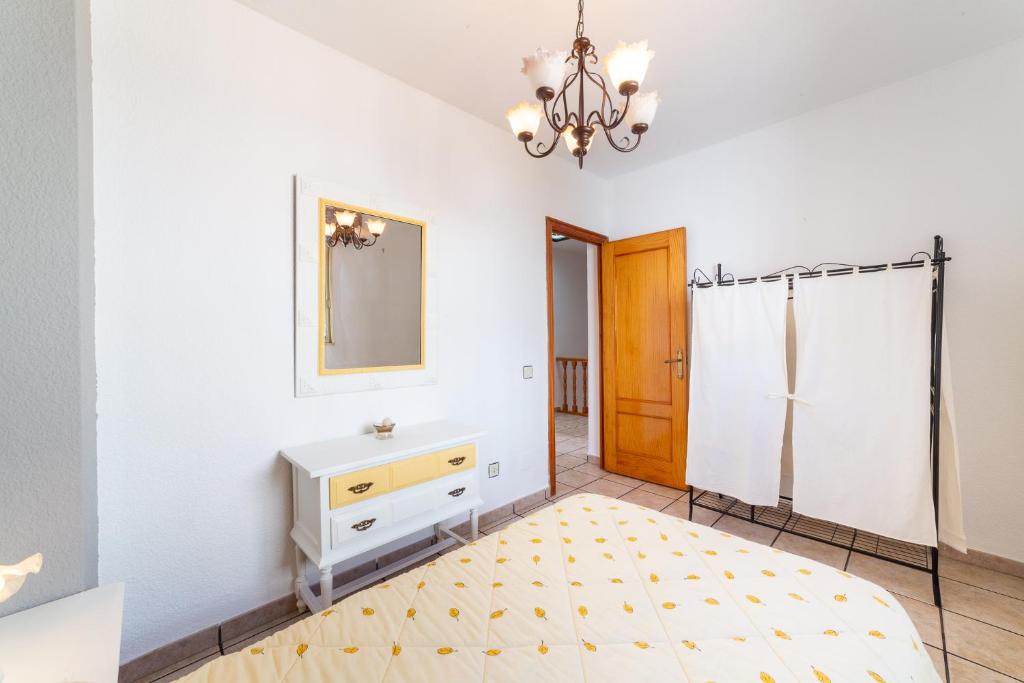 Posteľ alebo postele v izbe v ubytovaní Casa Rural La Buganvilla