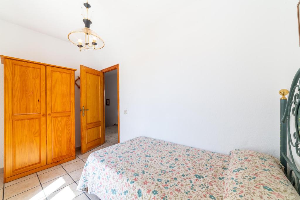 Posteľ alebo postele v izbe v ubytovaní Casa Rural La Buganvilla