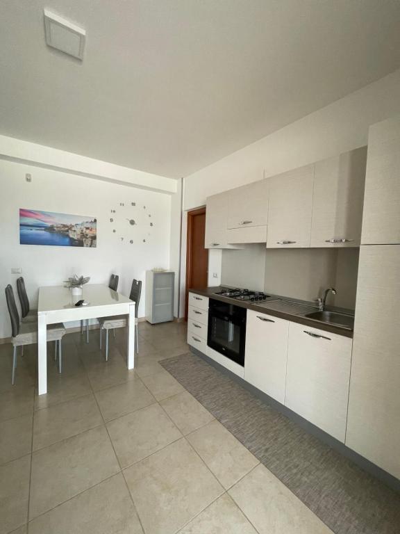 Kuchyň nebo kuchyňský kout v ubytování M&M Home