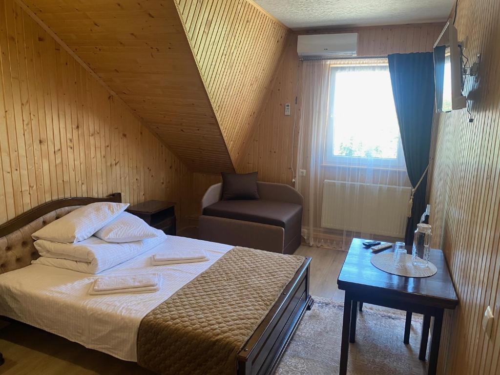 Postel nebo postele na pokoji v ubytování Holi Day