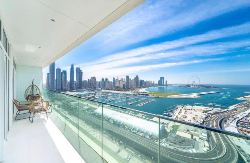 a balcony with a view of the city at Exquisite 2BR in Sunrise bay at Emaar Beachfront in Dubai