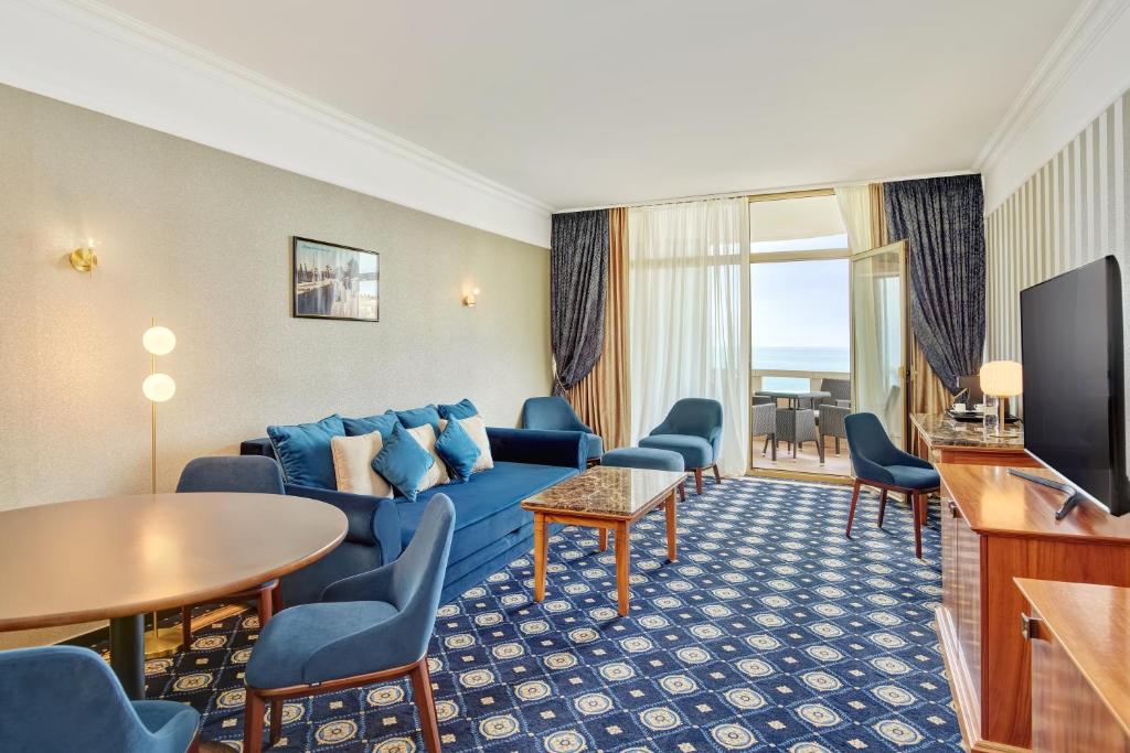 TV a/nebo společenská místnost v ubytování Remisens Hotel METROPOL