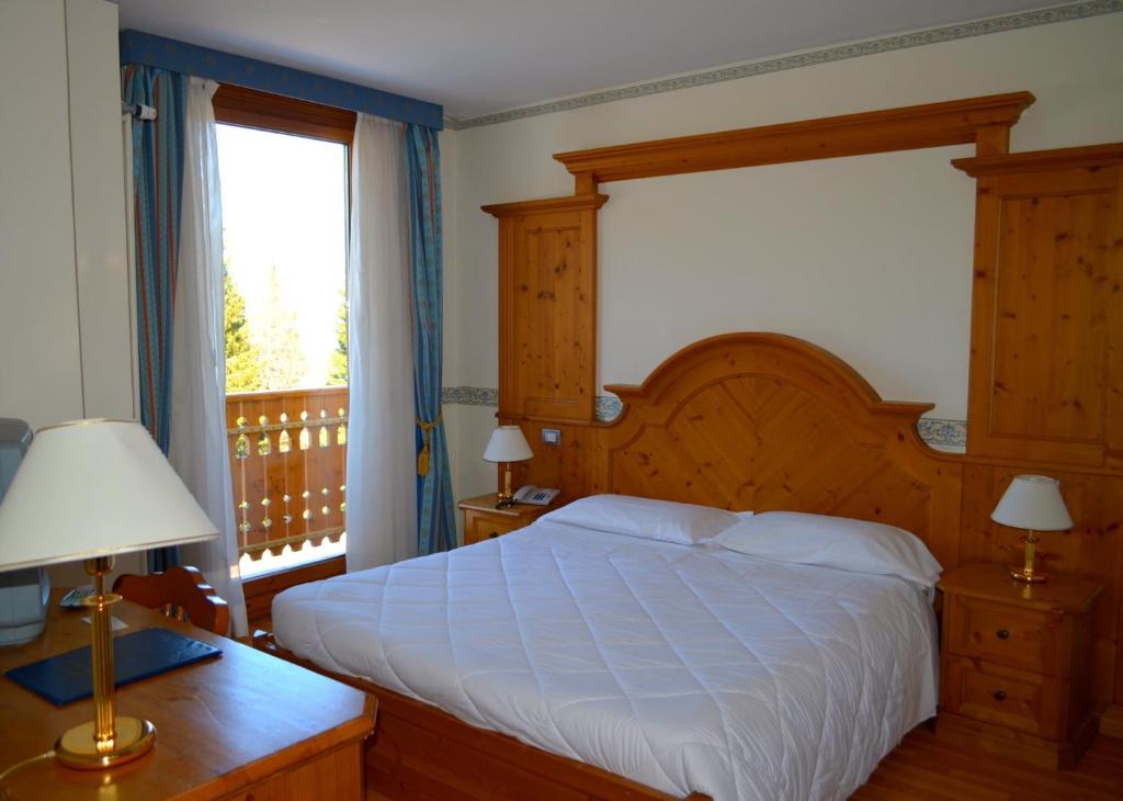 Postel nebo postele na pokoji v ubytování Park Hotel