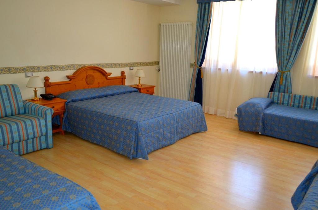 Postel nebo postele na pokoji v ubytování Park Hotel