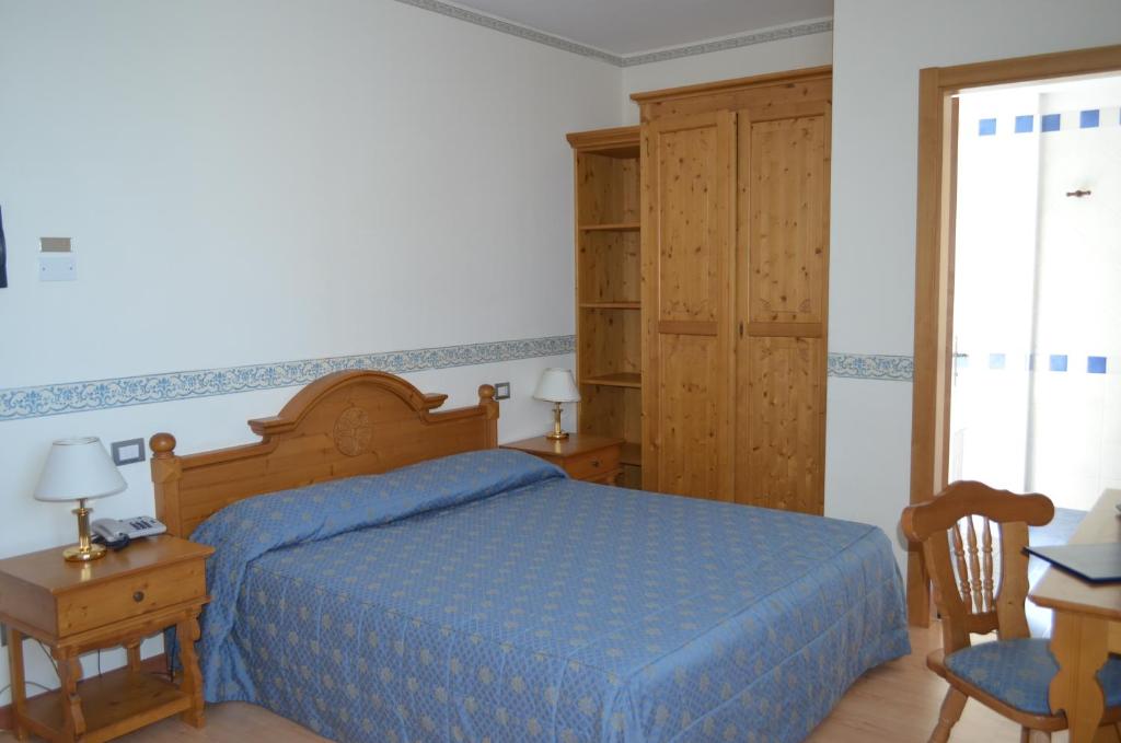 Postel nebo postele na pokoji v ubytování Park Hotel