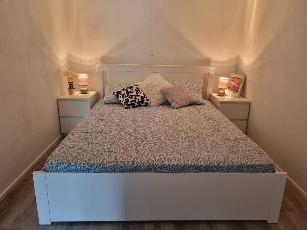 Postel nebo postele na pokoji v ubytování Dalla Rossa Apartment