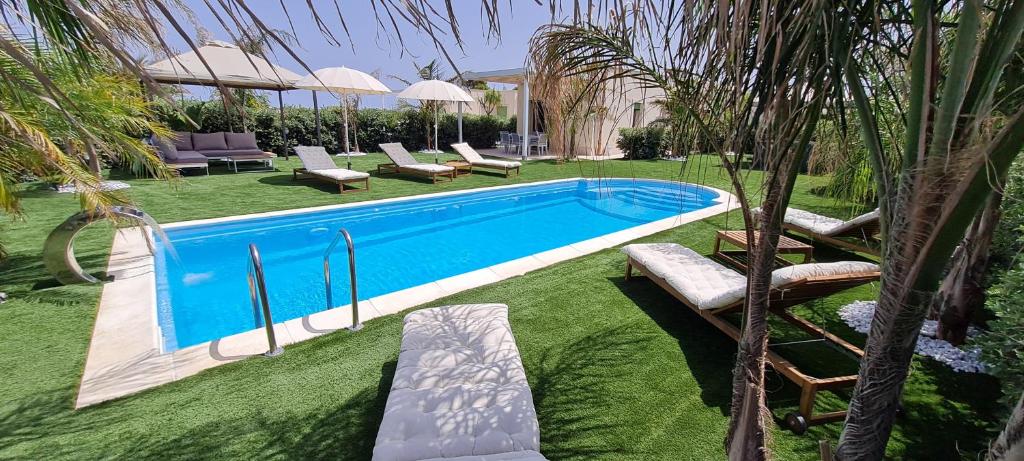 Basen w obiekcie Villa Gisira - Luxury SPA lub w pobliżu