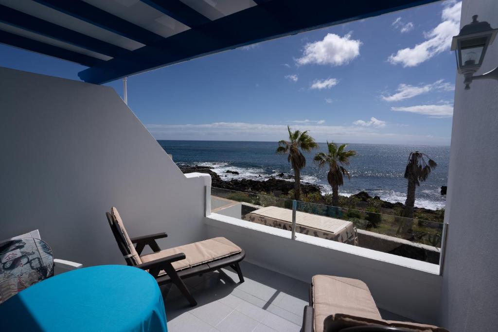 プンタ・ムヘーレスにあるCasa La Sebaの海の景色を望むバルコニー