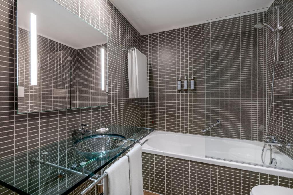 Koupelna v ubytování AC Hotel Brescia by Marriott