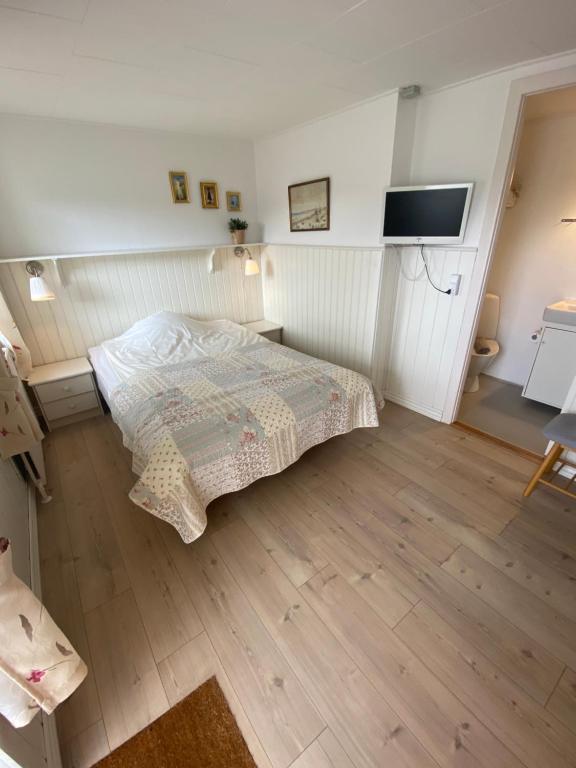 Postel nebo postele na pokoji v ubytování Klithjem Badehotel
