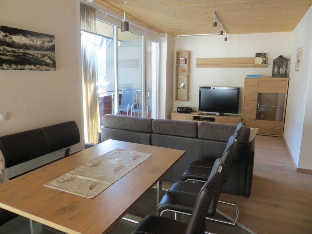Televízia a/alebo spoločenská miestnosť v ubytovaní Apart Belmont