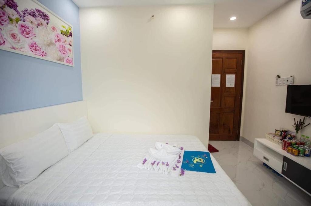Postel nebo postele na pokoji v ubytování HOTEL & APARTMENT VY VAN