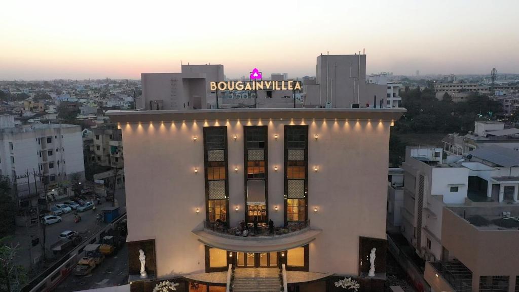a building with a sign on top of it at Bougainvillea Banquets and Convention Centre in Nagpur