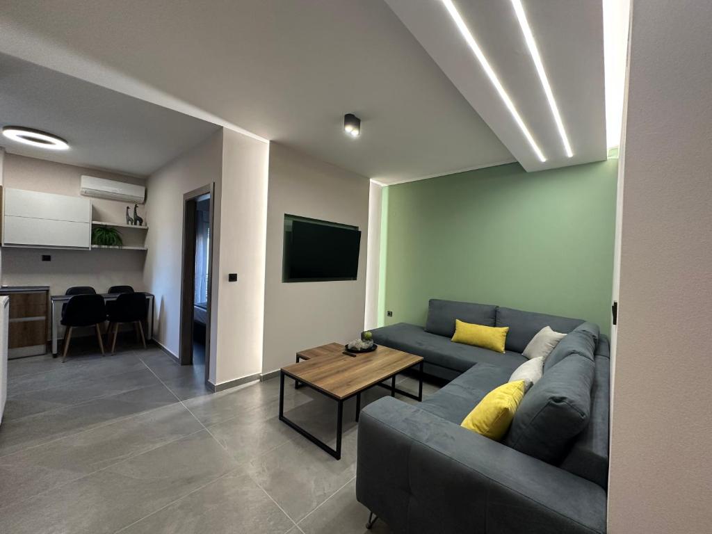 Telewizja i/lub zestaw kina domowego w obiekcie Top Line & Modern Apartments in Ioannina