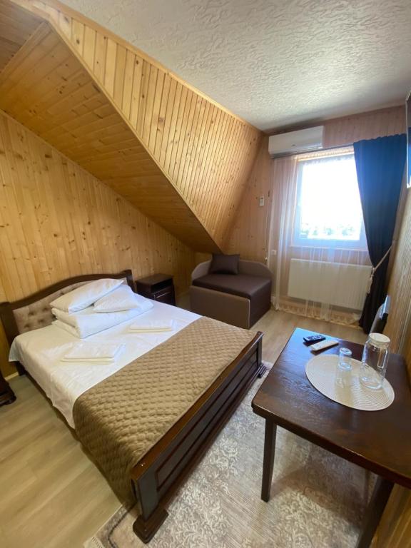 Postel nebo postele na pokoji v ubytování Holi Day
