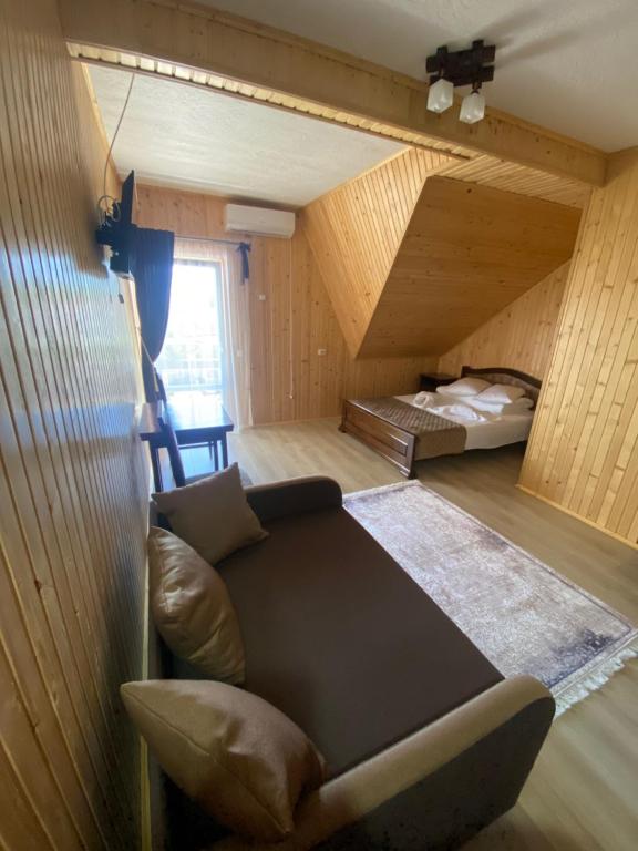 Postel nebo postele na pokoji v ubytování Holi Day