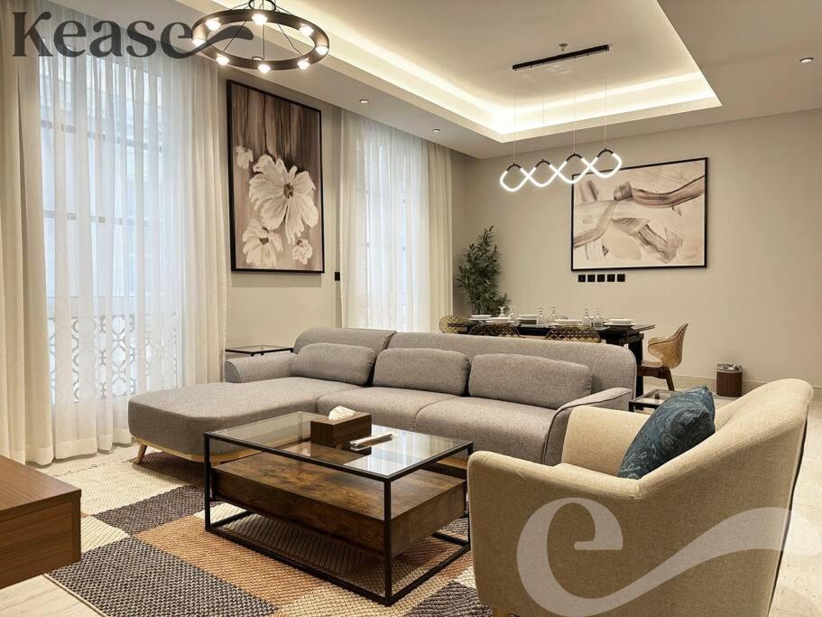 a living room with a couch and a table at Kease King Salman T-6 Royal Touch GZ61 in Riyadh