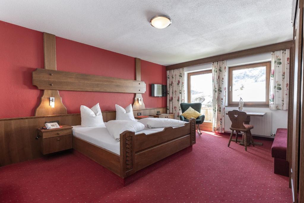 Postel nebo postele na pokoji v ubytování Hotel Garni Birkhahn