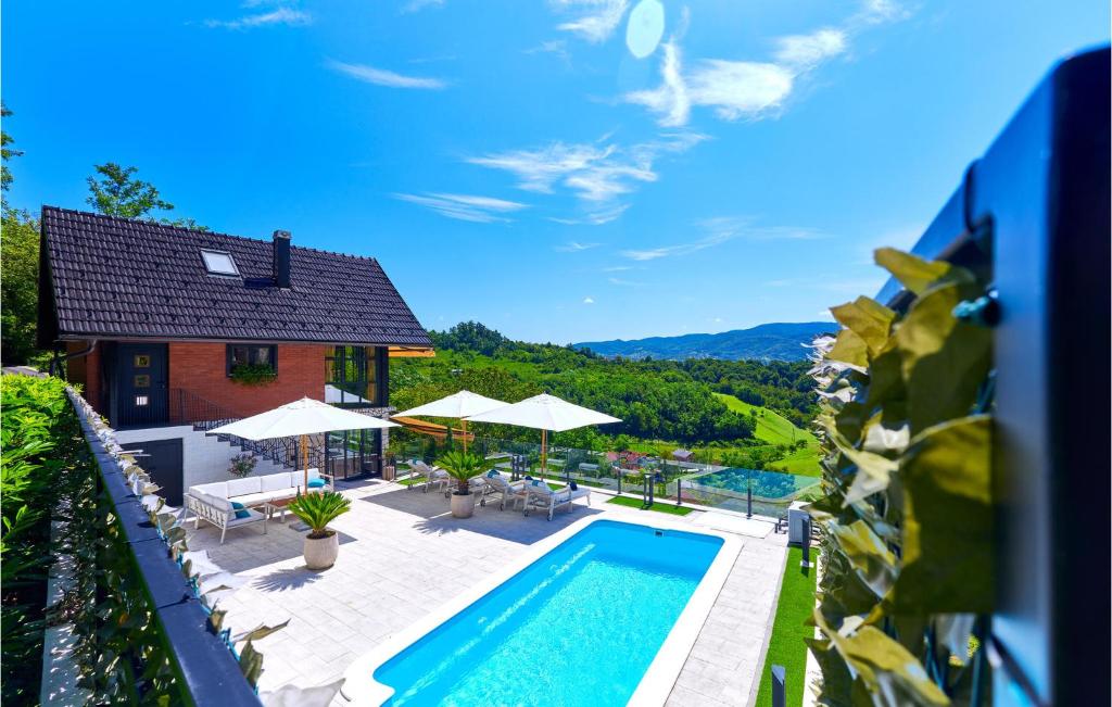 an aerial view of a house with a swimming pool at Lovely Home In Donja Stubica With Outdoor Swimming Pool in Donja Stubica