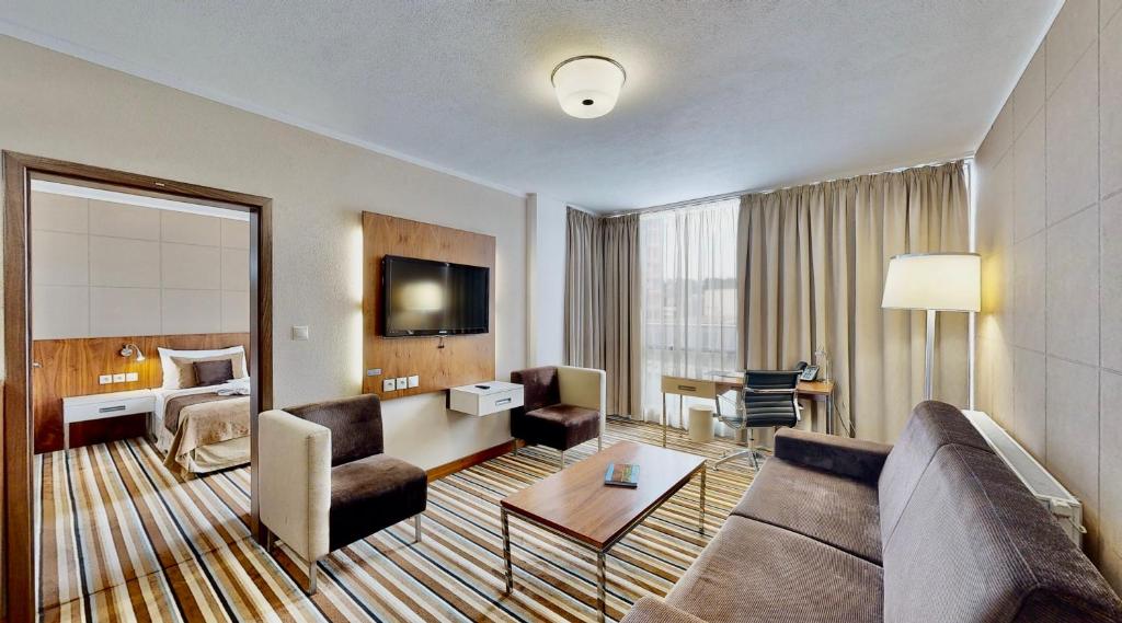 Posezení v ubytování Business Hotel Astrum Laus