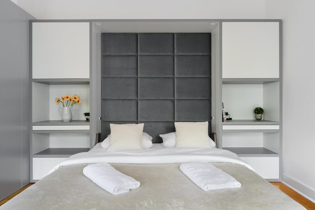 Posteľ alebo postele v izbe v ubytovaní P&O Apartments Warecka Street
