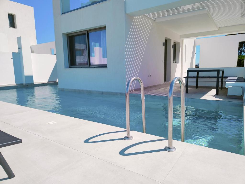 Bazén v ubytování Alpha Villas nebo v jeho okolí