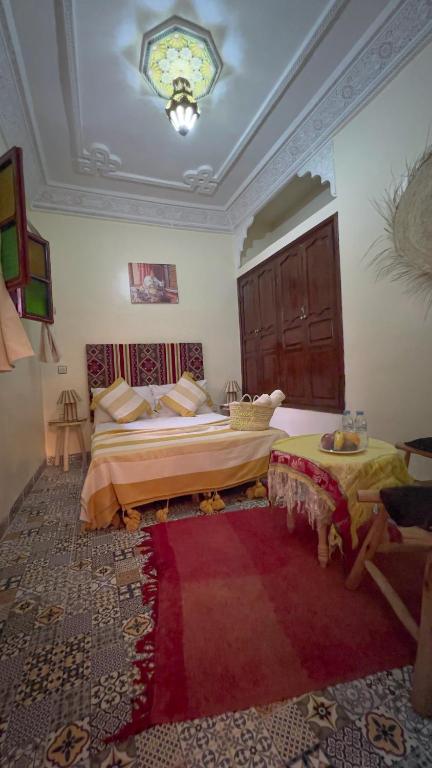 Postel nebo postele na pokoji v ubytování Riad Hayat