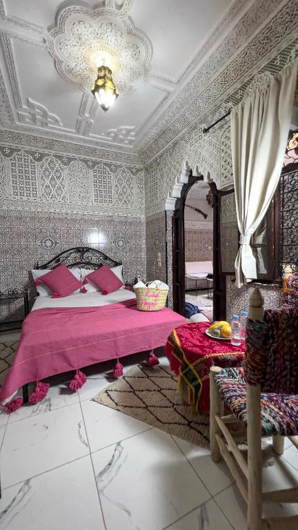 Postel nebo postele na pokoji v ubytování Riad Hayat