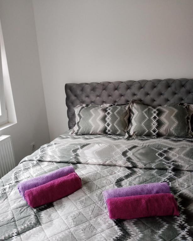 Postel nebo postele na pokoji v ubytování Apartman Nikolic