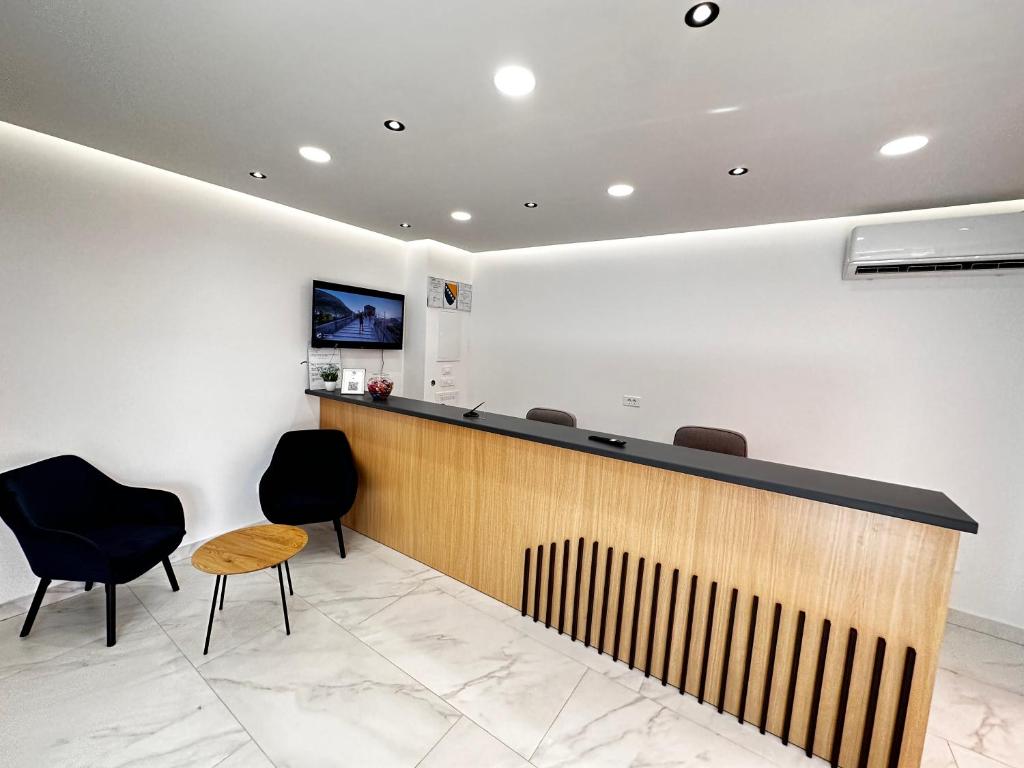 TV a/nebo společenská místnost v ubytování Hotel MM Residence