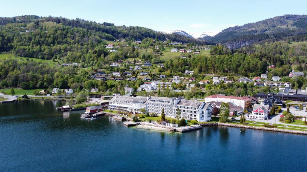 an aerial view of a resort on a lake at Brakanes Hotel in Ulvik