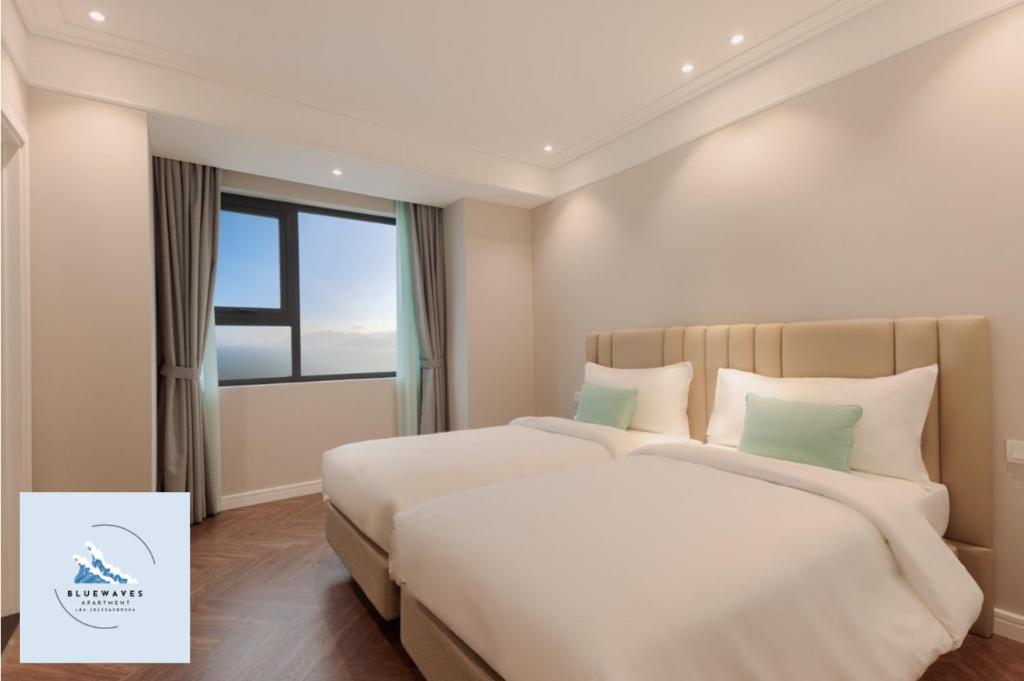 Postel nebo postele na pokoji v ubytování Bluewaves Apartment Quy Nhon - Altara Seaview