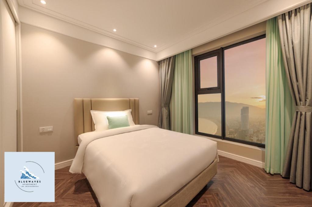 Postel nebo postele na pokoji v ubytování Bluewaves Apartment Quy Nhon - Altara Seaview