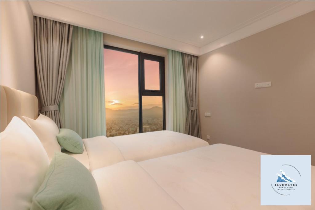 Postel nebo postele na pokoji v ubytování Bluewaves Apartment Quy Nhon - Altara Seaview