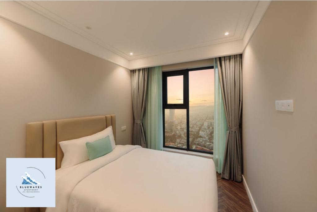 Postel nebo postele na pokoji v ubytování Bluewaves Apartment Quy Nhon - Altara Seaview