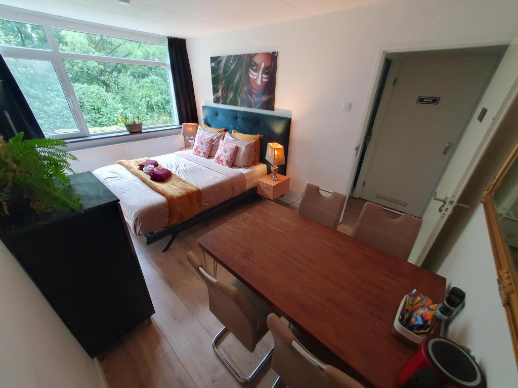 Postel nebo postele na pokoji v ubytování B&B Immerloopark