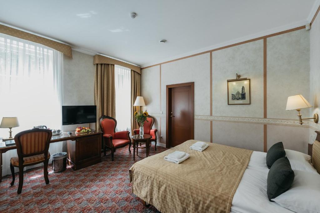 TV a/nebo společenská místnost v ubytování Hotel Rinno
