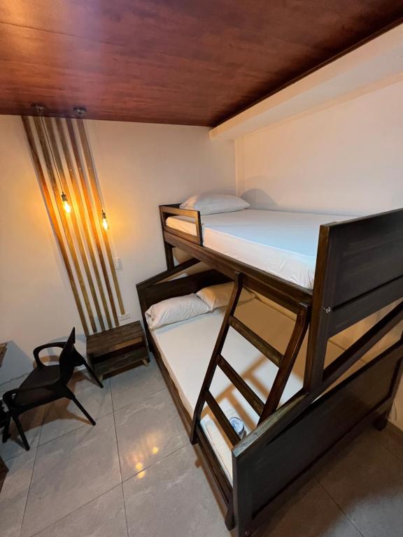 Postel nebo postele na pokoji v ubytování Hotel Almalu