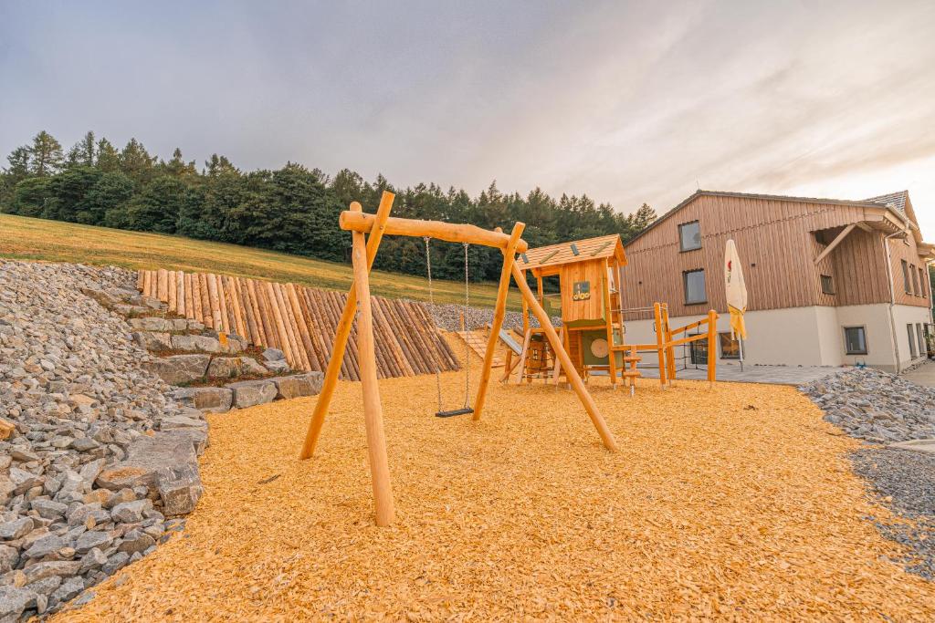 Herní místnost nebo prostor pro děti v ubytování Holzspan