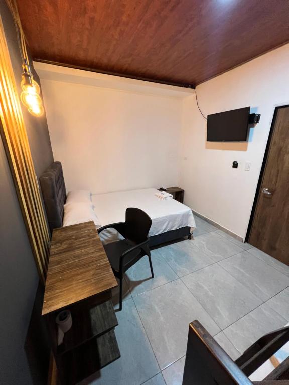 TV a/nebo společenská místnost v ubytování Hotel Almalu